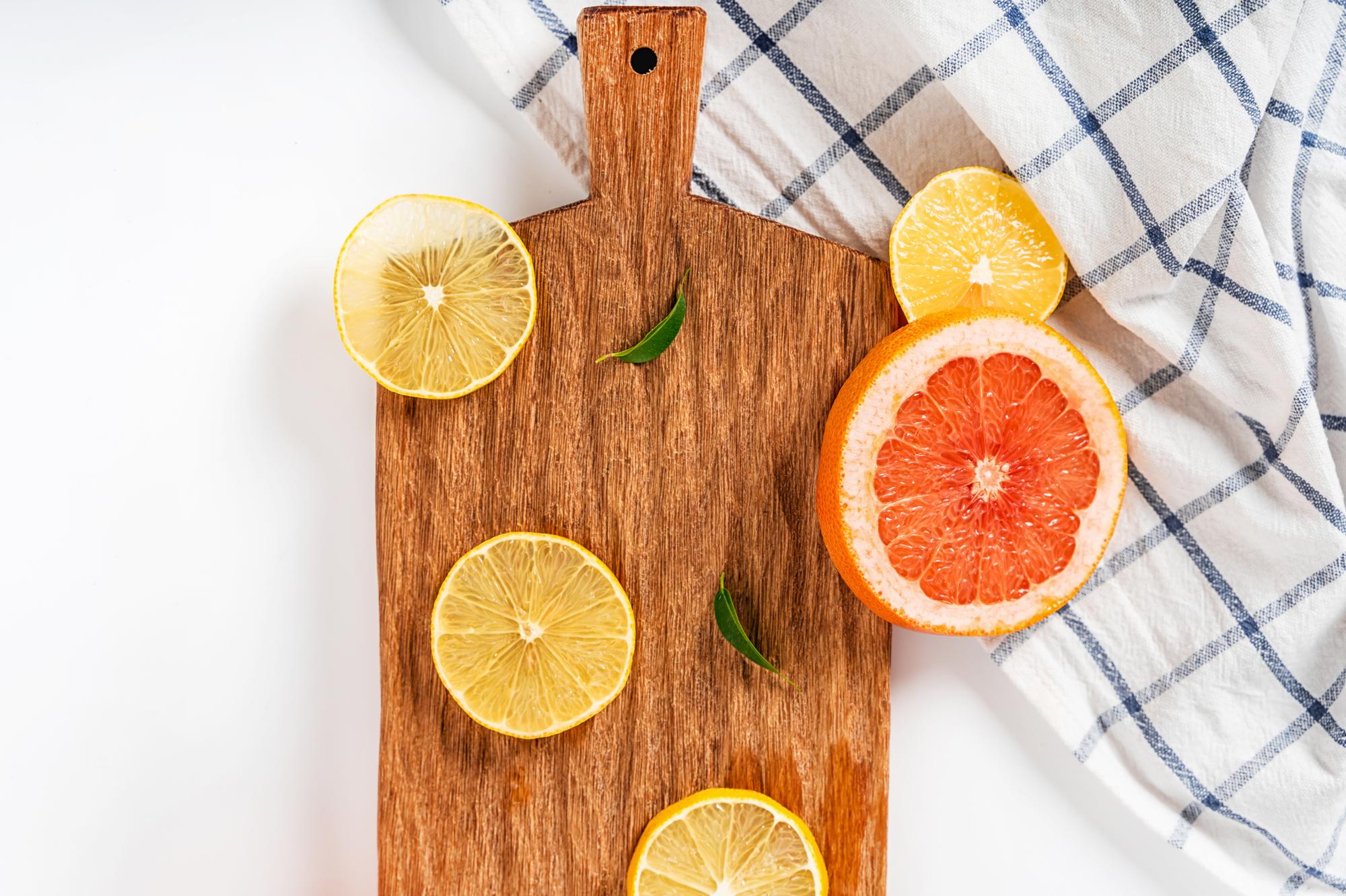 close-up of citrus segments on cutting board